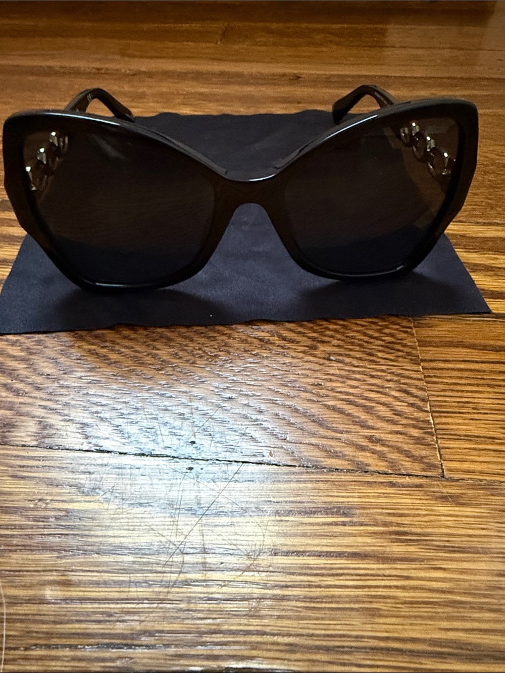 Moschino Black Cat-Eye Women's Sunglasses with Subtle Silver Accents